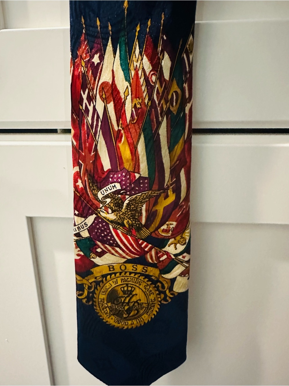 Boss Navy Silk Tie with Gold Crest and Red Accents